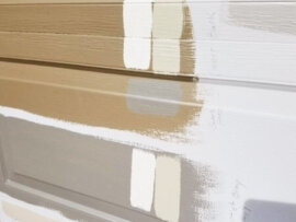 Paint samples painted on house