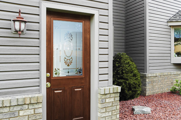 New brown entry door on Omaha house