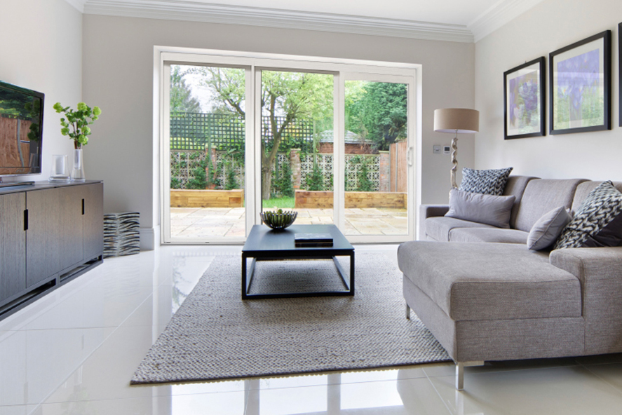 Sliding patio door with three panels in white